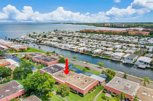 aerial view with a water view and a residential view