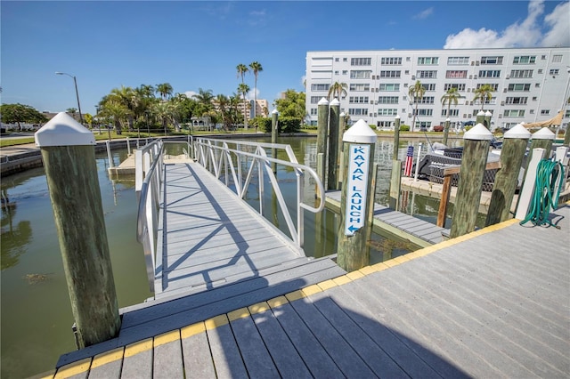 dock area featuring a water view