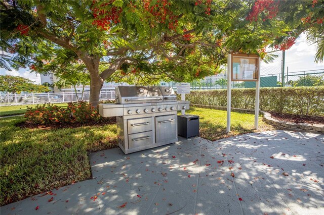 view of patio / terrace featuring fence and area for grilling