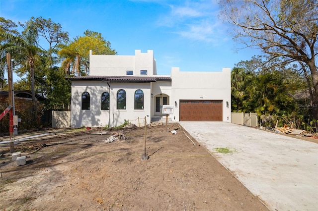 adobe home with a garage