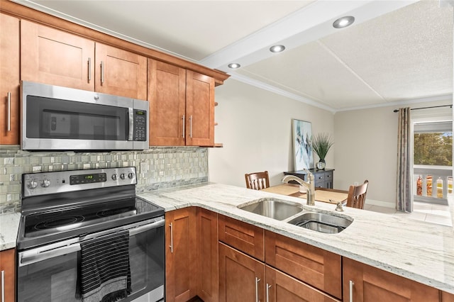 kitchen with sink, kitchen peninsula, stainless steel appliances, light stone countertops, and decorative backsplash