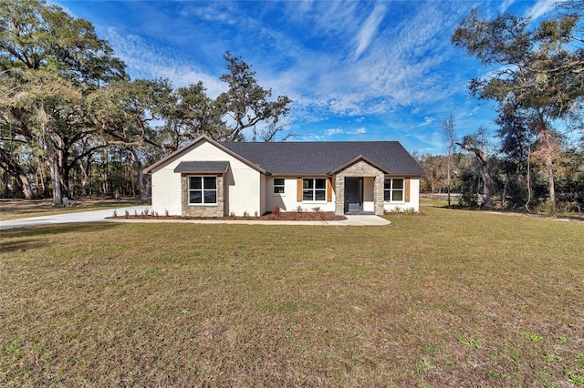 single story home with a front yard