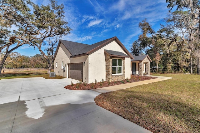 view of home's exterior featuring a yard and a garage