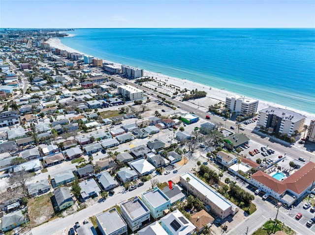 bird's eye view with a water view and a view of the beach