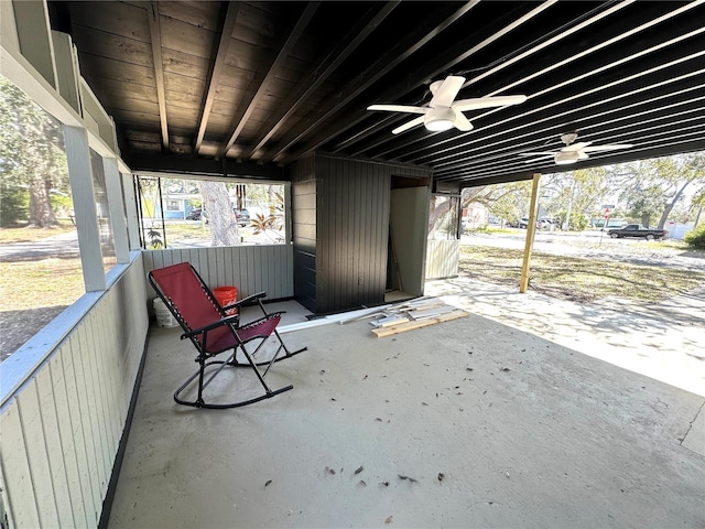 view of patio featuring ceiling fan