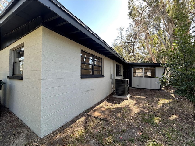 view of property exterior featuring cooling unit