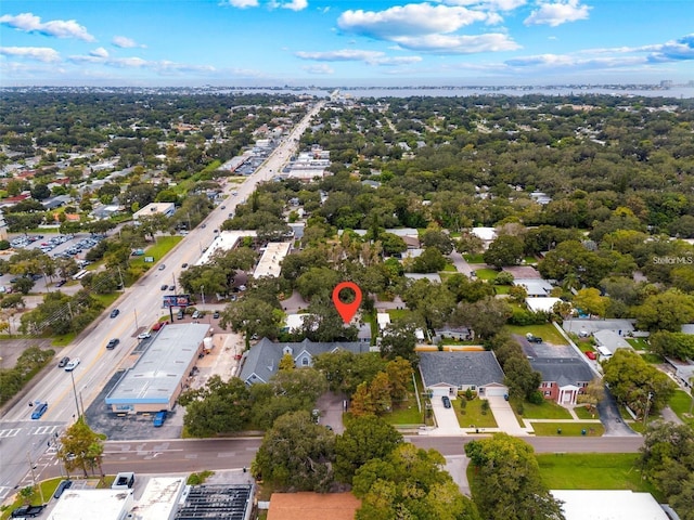 aerial overview of property's location with nearby suburban area