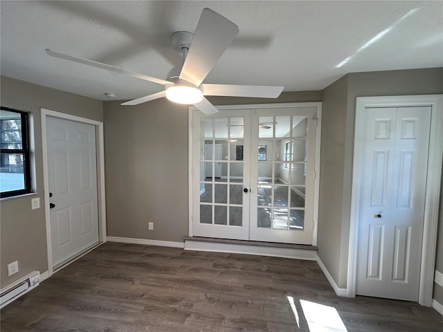interior space featuring french doors, ceiling fan, baseboards, and wood finished floors