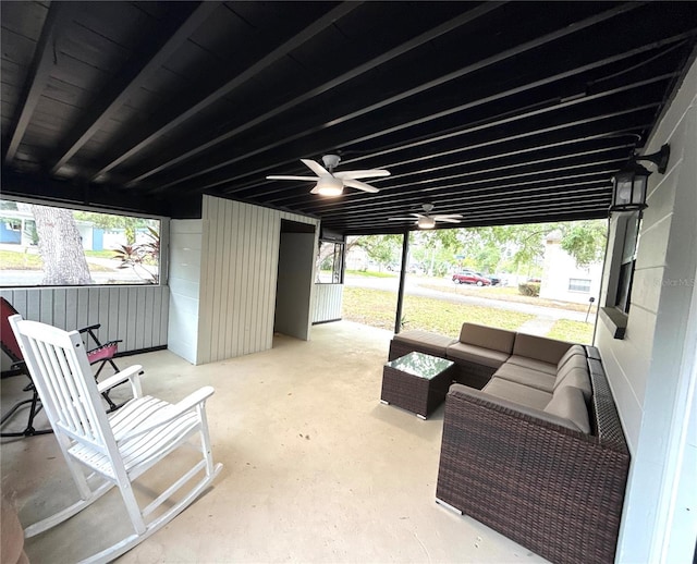 view of patio with an outdoor hangout area and a ceiling fan