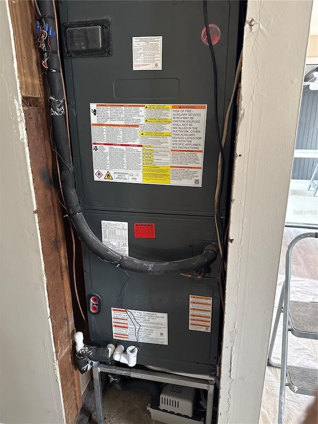 utility room with heating unit