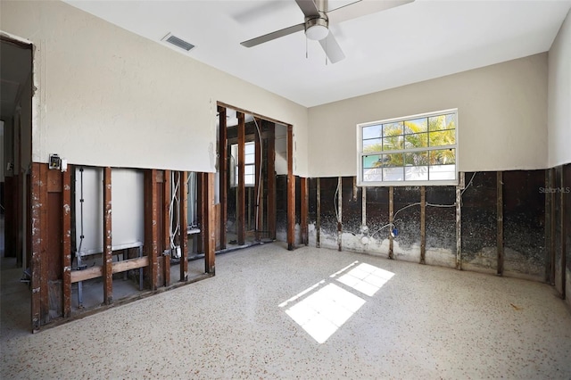 unfurnished room with ceiling fan