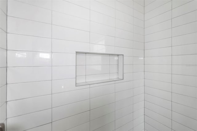 details featuring a tile shower