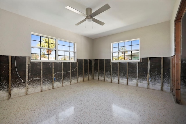 empty room featuring ceiling fan