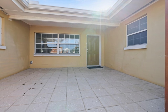 property entrance with a patio