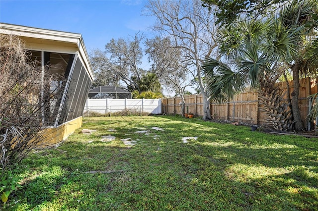 view of yard with a sunroom