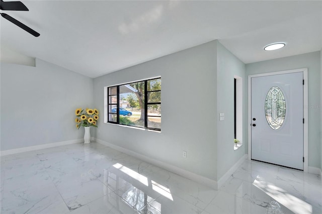 foyer featuring ceiling fan