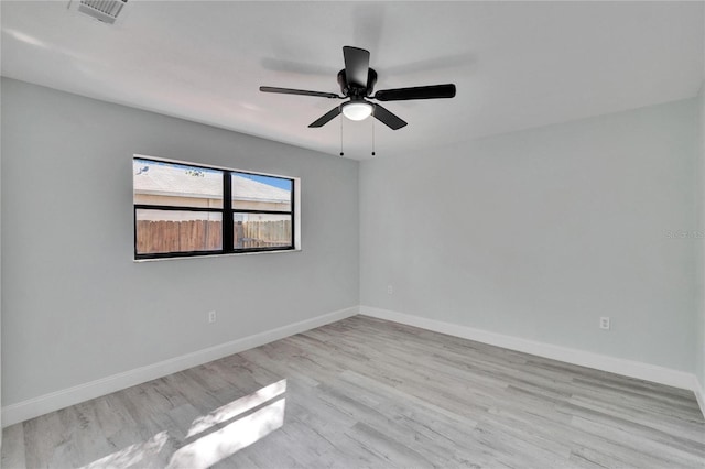 unfurnished room featuring ceiling fan and light hardwood / wood-style floors