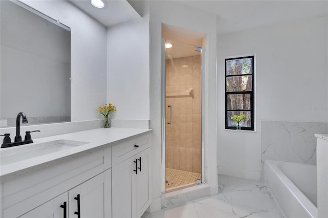 bathroom featuring plus walk in shower and vanity