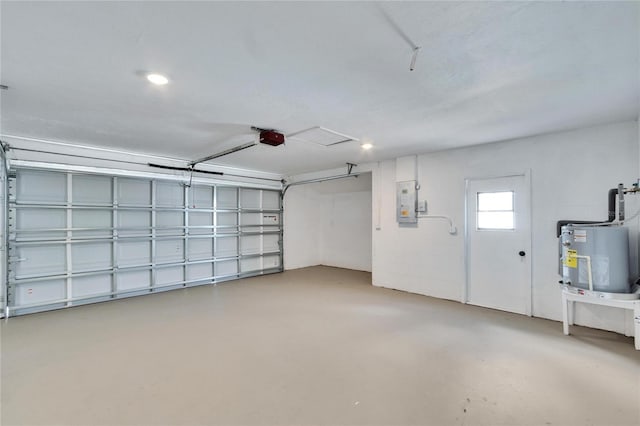 garage featuring a garage door opener, electric panel, and electric water heater