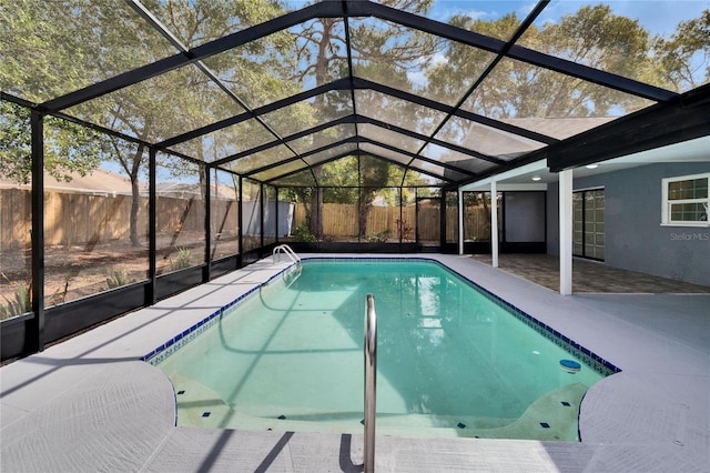 view of pool featuring a lanai and a patio area