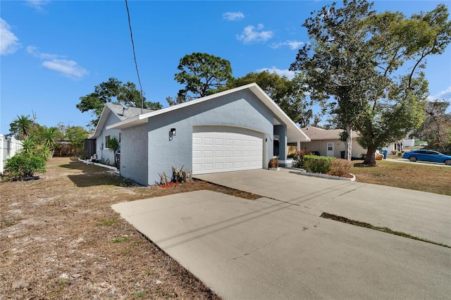 view of side of home with a garage