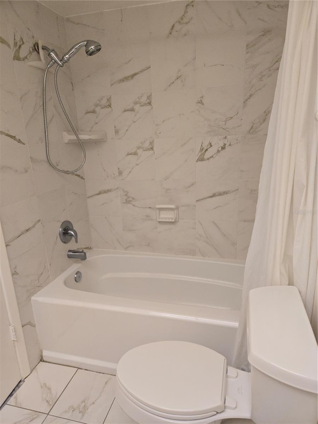 4915 Bay St NE Unit 322, Saint Petersburg, FL 33703 - full bathroom with toilet, shower / bath combination with curtain, and marble finish flooring