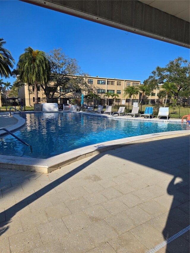 4915 Bay St NE Unit 322, Saint Petersburg, FL 33703 - community pool with a patio area