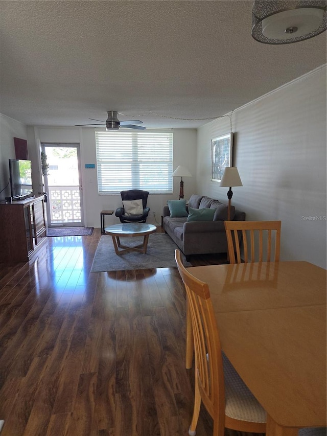 4915 Bay St NE Unit 322, Saint Petersburg, FL 33703 - living room with a textured ceiling, wood finished floors, and ceiling fan