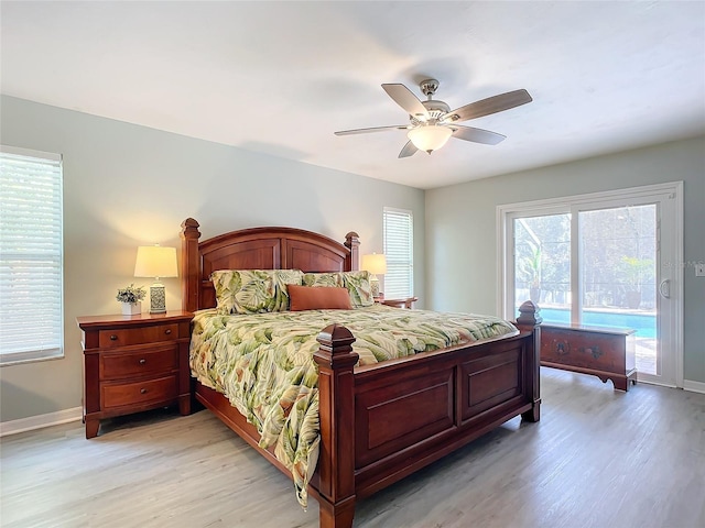 bedroom with ceiling fan, access to exterior, and light hardwood / wood-style floors