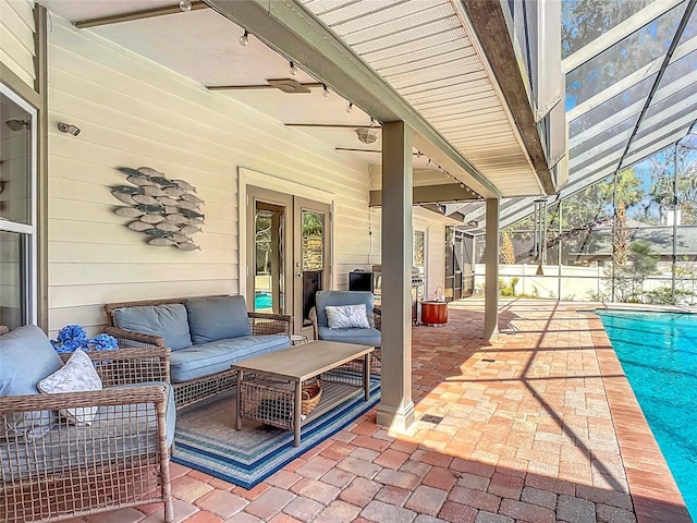 view of patio / terrace featuring a fenced in pool and an outdoor hangout area