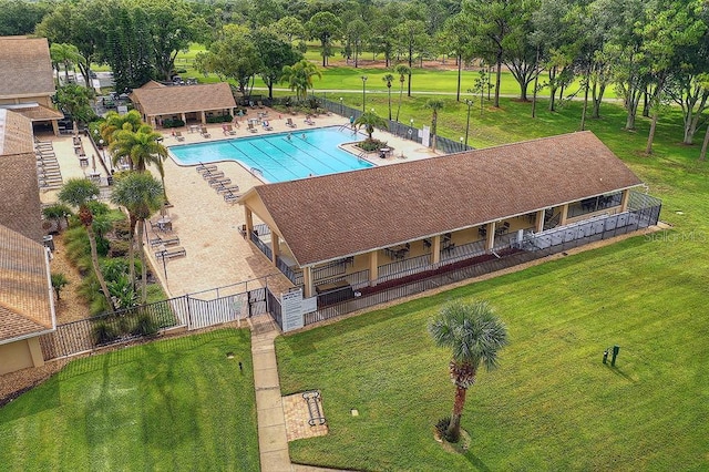 view of pool with a yard and a patio area