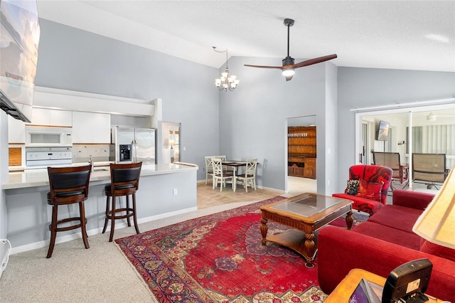 carpeted living room featuring high vaulted ceiling, ceiling fan with notable chandelier, and a textured ceiling