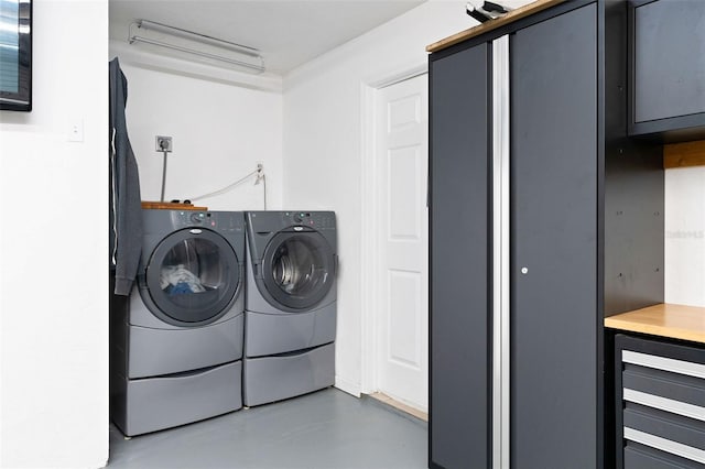 washroom featuring separate washer and dryer