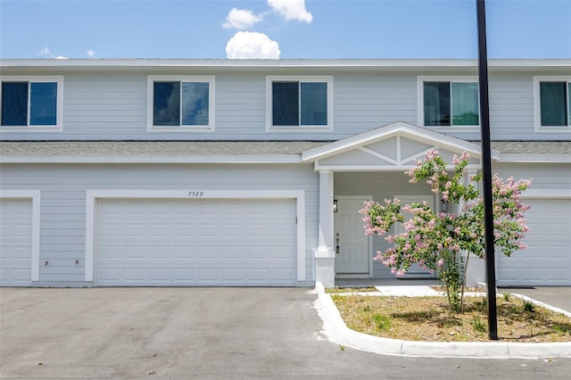 view of front property with a garage