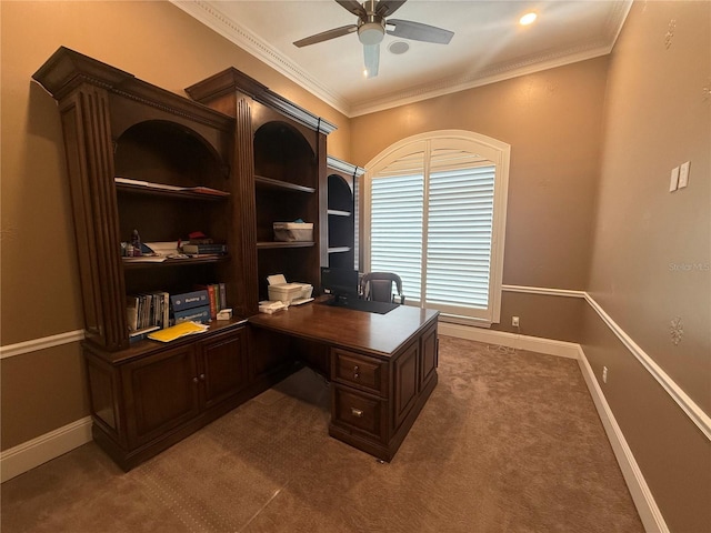 office area with ornamental molding, carpet flooring, baseboards, and a ceiling fan