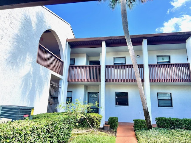 view of property with central AC unit