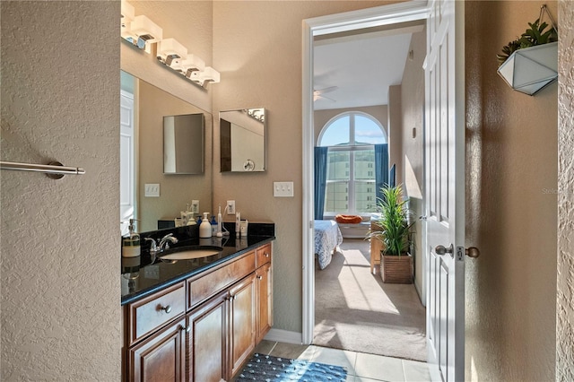 bathroom featuring tile patterned floors and vanity