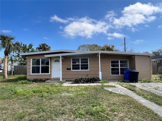 view of front of house with a front lawn