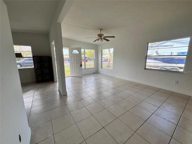7563 Meadowlawn Dr N, Saint Petersburg, FL 33702 - tiled spare room featuring lofted ceiling and ceiling fan