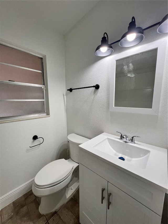 7563 Meadowlawn Dr N, Saint Petersburg, FL 33702 - bathroom featuring vanity and toilet