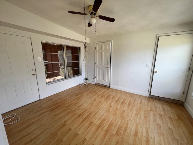 7563 Meadowlawn Dr N, Saint Petersburg, FL 33702 - empty room with ceiling fan and light hardwood / wood-style floors