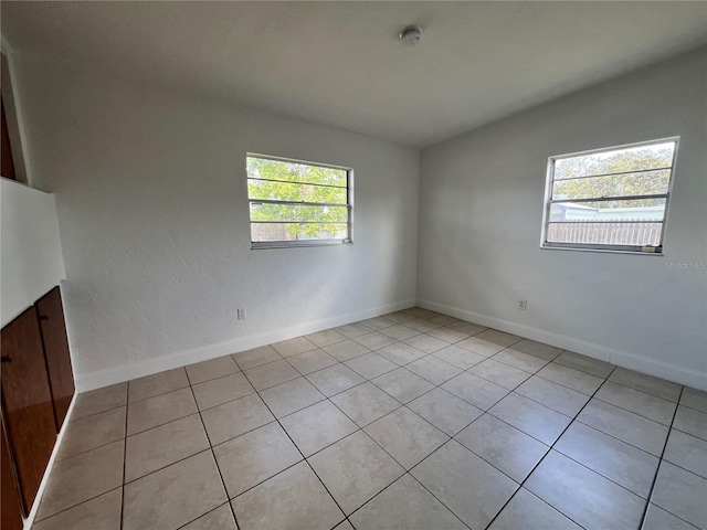7563 Meadowlawn Dr N, Saint Petersburg, FL 33702 - empty room featuring lofted ceiling