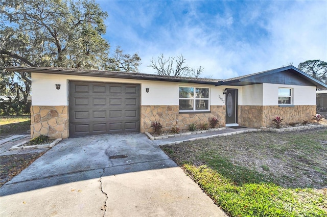 single story home featuring a garage