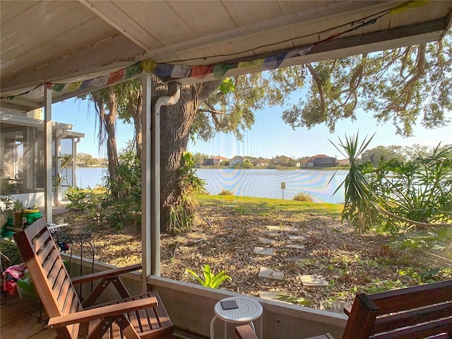 exterior space with a water view