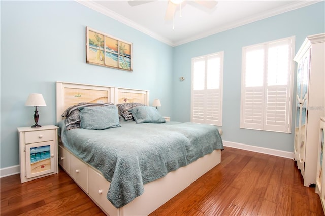 bedroom with crown molding, wood-type flooring, and ceiling fan