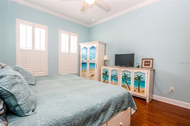 bedroom featuring dark wood-type flooring, ceiling fan, and ornamental molding