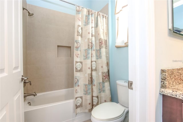 full bathroom featuring vanity, toilet, and shower / tub combo