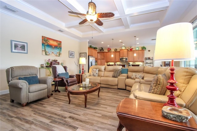 living room featuring beamed ceiling, ornamental molding, coffered ceiling, and light hardwood / wood-style floors