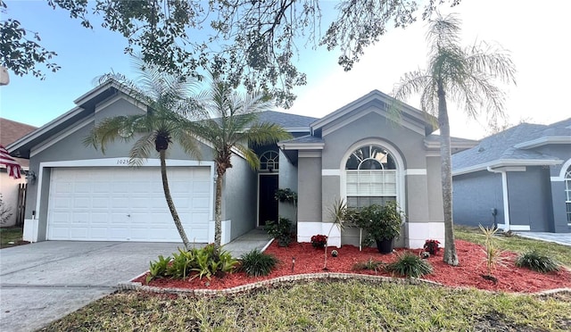 single story home with a garage