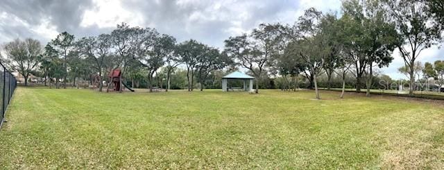 view of yard with a playground and a gazebo